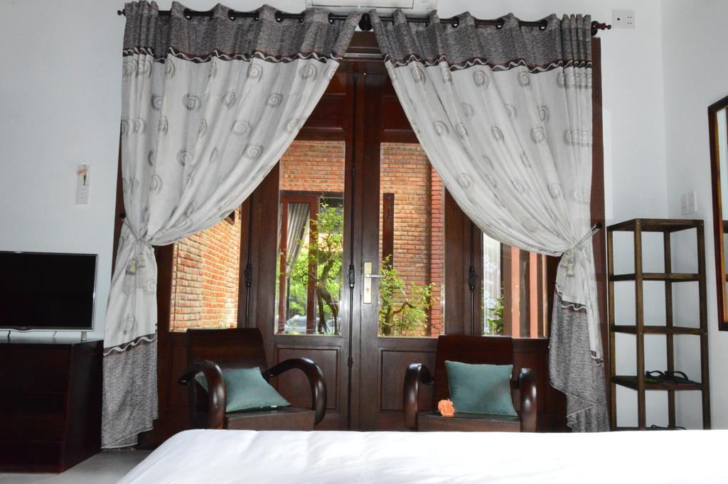 הוי אן 313 Cua Dai - Viet House Homestay חדר תמונה